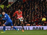 Ashley Young of Manchester United scores his team's second goal during the Barclays Premier League match between Manchester United and Cardiff City at Old Trafford on January 28, 2014