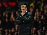 Manchester United Manager David Moyes looks on during the Barclays Premier League match between Manchester United and Cardiff City at Old Trafford on January 28, 2014