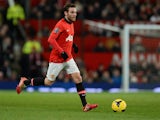 Manchester United's Spanish midfielder Juan Mata controls the ball during the English Premier League football match between Manchester United and Cardiff City at Old Trafford in Manchester, northwest England, on January 28, 2014
