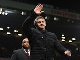 Cardiff City Manager Ole Gunnar Solskjaer salutes the crowd prior to the Barclays Premier League match between Manchester United and Cardiff City at Old Trafford on January 28, 2014