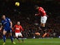 Robin van Persie of Manchester United scores the opening goal during the Barclays Premier League match between Manchester United and Cardiff City at Old Trafford on January 28, 2014