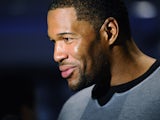 Michael Strahan, Former NFL player and co-host of 'LIVE with Kelly and Michael,' answers questions from the press during the FOX Sports media availablility in the Empire East Ballroom, at Super Bowl XLVIII Media Center at the Sheraton New York Times Squar