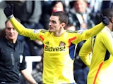 Sunderland's English midfielder Adam Johnson celebrates after scoring his team's second goal during the English Premier League football match between Newcastle United and Sunderland at St James' Park in Newcastle upon Tyne on February 1, 2014