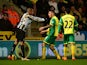 Loic Remy of Newcastle United and Bradley Johnson of Norwich City come to blows during the Barclays Premier League match between Norwich City and Newcastle United at Carrow Road on January 28, 2014