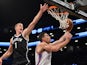 Nick Collison of the Oklahoma City Thunder drives against Mason Plumlee of the Brooklyn Nets during their NBA game January 31, 2014