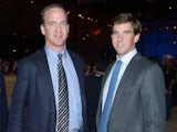 Peyton Manning (L) and Eli Manning attend DIRECTV'S Seventh Annual Celebrity Beach Bowl at DTV SuperFan Stadium at Mardi Gras World on February 2, 2013 