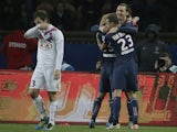 Swedish forward Zlatan Ibrahimovic celebrates with teammates after scoring during a French L1 football match between Paris Saint-Germain (PSG) and Bordeaux (FCGB) on January 31, 2014