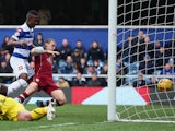 Modibo Maiga of Queens Park Rangers scores during the Sky Bet Championship match between Queens Park Rangers and Burnley at Loftus Road on February 1, 2014