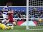 Modibo Maiga of Queens Park Rangers scores during the Sky Bet Championship match between Queens Park Rangers and Burnley at Loftus Road on February 1, 2014