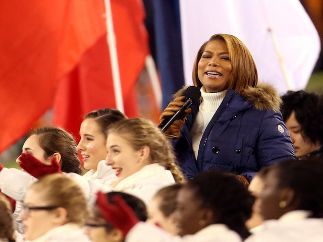 Queen Latifah sings 'America the Beatiful' prior to the Seattle Seahawks taking on the Denver Broncos in Super Bowl XLVIII at MetLife Stadium on February 2, 2014