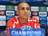 Olympiacos' Algerian player Rafik Djebbour attends a press conference on October 23, 2012