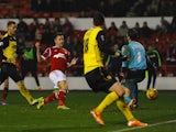 Simon Cox of Nottingham Forest scores during the Sky Bet Championship match between Nottingham Forest and Watford at City Ground on January 30, 2014 