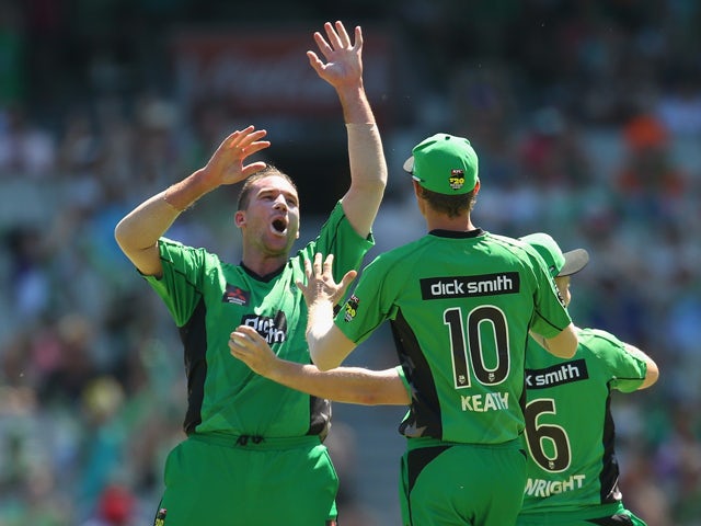 John Hastings of the Stars congratulates Luke Wright after he took a catch off his bowling to dismiss Mitchell Marsh of the Scorchers during the Big Bash League match between the Melbourne Stars and the Perth Scorchers at Melbourne Cricket Ground on Janua
