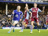 Steven Naismith of Everton celebrates after scoring the first goal during the Barclays Premier League match against Aston Villa on February 1, 2014