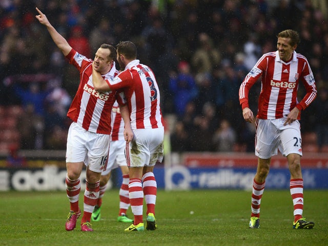 Charlie Adam of Stoke City celebrates scoring his second goal during the Barclays Premier League match between Stoke City and Manchester United at Britannia Stadium on February 1, 2014