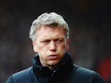 David Moyes, manager of Manchester United walks out for the Barclays Premier League match between Stoke City and Manchester United at Britannia Stadium on February 1, 2014