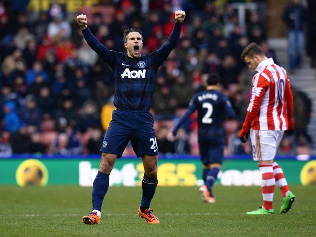 Manchester United's Dutch striker Robin van Persie celebrates scoring an equalising goal during the English Premier League football match between Stoke City and Manchester United at the Britannia Stadium in Stoke on Trent on February 1, 2014
