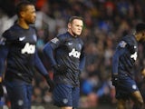 Wayne Rooney of Manchester United looks dejected during the Barclays Premier League match between Stoke City and Manchester United at Britannia Stadium on February 1, 2014
