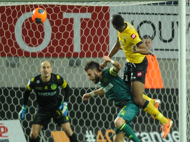 Sochaux' Zambian defender Stoppila Sunzu scores a goal against Nantes during the French L1 football match on February 1, 2014