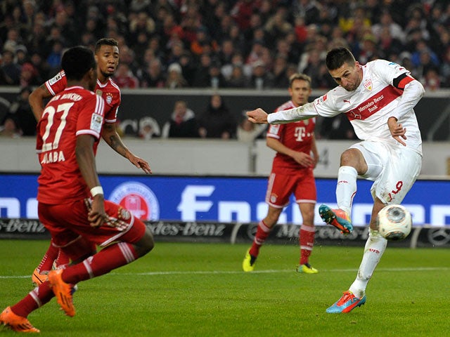 Stuttgart's Vedad Ibisevic scores the opening goal against Bayern Munich during their Bundesliga match on January 29, 2014