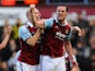 Kevin Nolan of West Ham United celebrates with James Collins as he scores their first goal during the Barclays Premier League match between West Ham United and Swansea City at Boleyn Ground on February 1, 2014