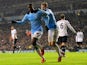 Manchester City's Yaya Toure celebrates after scoring his team's second goal via the penalty spot against Tottenham during their Premier League match on January 29, 2014