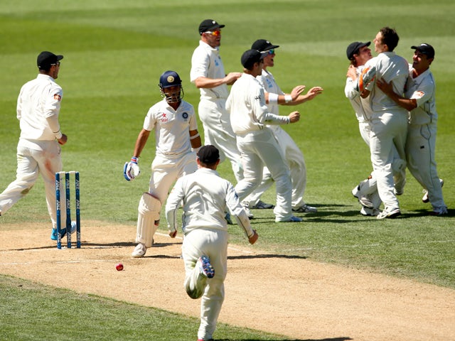 Ajinkya Rahane of India departs after being trapped LBW by Trent Boult of New Zealand during day four of the First Test match between New Zealand and India at Eden Park on February 9, 2014