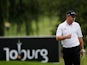 Alastair Forsyth prepares to putt on the 14th green during Day One of the Joburg Open on February 6, 2013