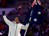Snowboarder Alex Pullin of the Australia Olympic team carries his country's flag during the Opening Ceremony of the Sochi 2014 Winter Olympics at Fisht Olympic Stadium on February 7, 2014