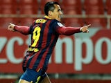 Barcelona's Alexis Sanchez celebrates after scoring his team's first goal against Sevilla on February 9, 2014