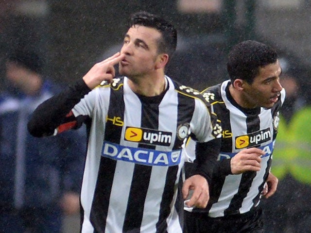 Antonio Di Natale of Udinese Calcio celebrates after scoring the opening goal during the TIM Cup match against ACF Fiorentina on February 4, 2014