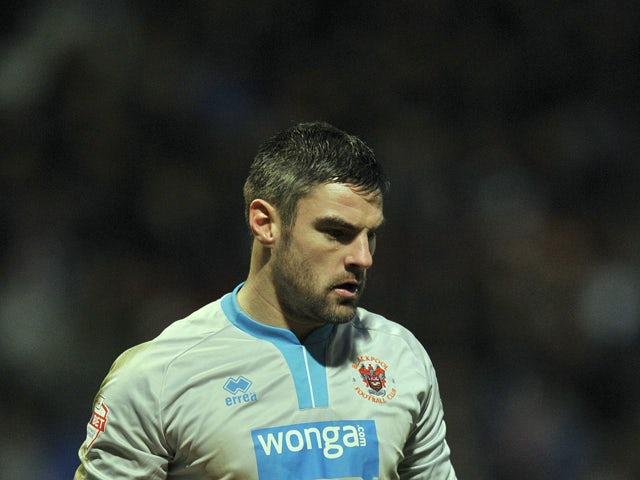 Matt Gilks of Blackpool during the FA Cup Third Round match between Bolton Wanderers and Blackpool at the Reebok Stadium on January 4, 2014