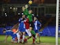 Bobby Olejnik of Peterborough United saves from Nile Ranger of Swindon Town during the Johnstone's Paint Southern Area Final on February 5, 2014