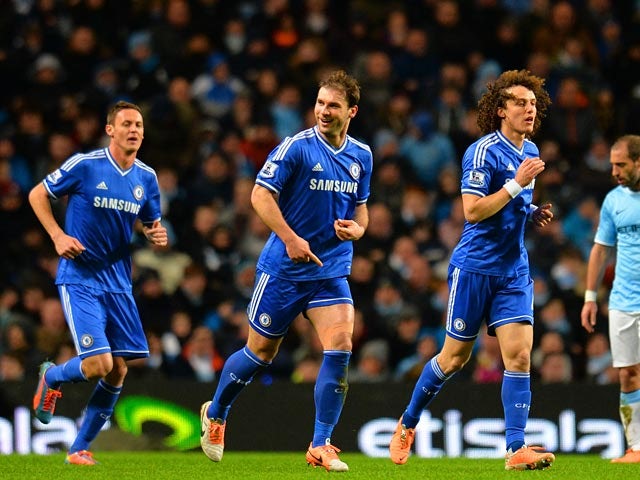 Chelsea's Branislav Ivanovic celebrates after scoring the opening goal against Manchester City during their Premier League match on February 3, 2014