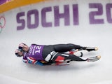USA's Christian Miccum and Jayson Terdiman race during a Luge Doubles training session at the Sanki Sliding Centre in Rosa Khutor on February 8, 2014