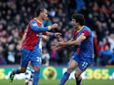 Marouane Chamakh of Palace celebrates with Mile Jidnak after scoring their third goal of the game with team mate Mile Jedinak during the Barclays Premier League match between Crystal Palace and West Bromwich Albion at Selhurst Park on Febuary 08, 2014