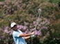 Edoardo Molinari of Italy hits his second shot on the 18th hole during Day Two of the Joburg Open at Royal Johannesburg and Kensington Golf Club on February 7, 2014