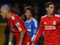 Fernando Torres of Chelsea looks across a Liverpool defenders Martin Skrtel (L), Daniel Agger (2R) and Jamie Carragher )R) during the Barclays Premier League on February 6, 2011