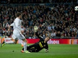 Real's Gareth Bale scores the opening goal against Villarreal during their La Liga match on February 8, 2014