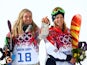 Gold medalist Jamie Anderson of the United States and bronze medalist Jenny Jones of Great Britain celebrate during the flower ceremony for the Women's Snowboard Slopestyle event at the 2014 Winter Olympics in Sochi, Russia