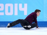 Jeremy Abbott of the USA takes a tumble during the figure skating men's short program in Sochi on February 6, 2014.