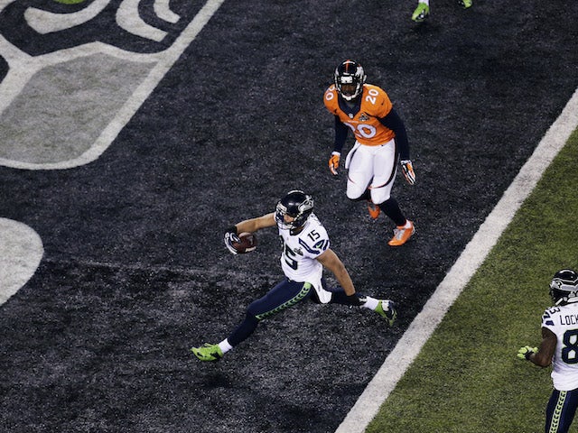 Wide receiver Jermaine Kearse #15 of the Seattle Seahawks scores a 23 yard touchdown during Super Bowl XLVIII against the Denver Broncos at MetLife Stadium on February 2, 2014