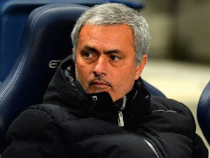 Mourinho plays down title chances