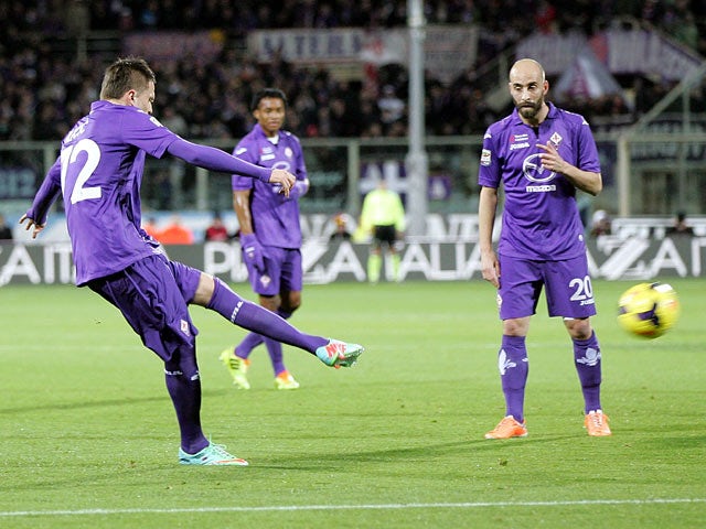 Fiorentina's Josip Ilicic scores the opening goal against Atalanta during their Serie A match on February 8, 2014