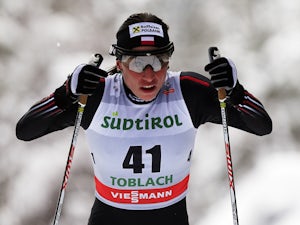 Injured Kowalczyk takes Olympic gold