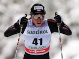 Poland's Justyna Kowalczyk competes during the FIS Ski World Cup Ladies' 10 Km Individual Classic race, on February 1, 2014