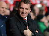 Liverpool Manager Brendan Rodgers gives a thumbs up prior to the Barclays Premier League match between Liverpool and Arsenal at Anfield on February 8, 2014