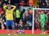 Arsenal's English midfielder Jack Wilshere reacts during the English Premier League football match between Liverpool and Arsenal at Anfield in Liverpool, northwest England, on February 8, 2014