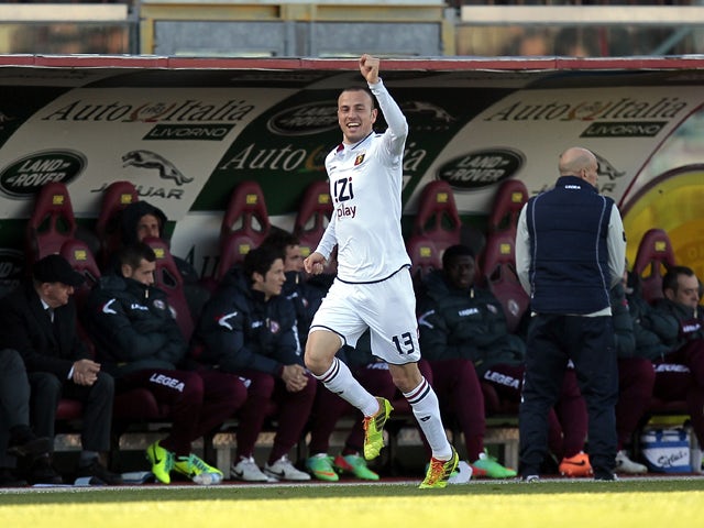 Luca Antonelli of Genoa CFC celebrates after scoring a goal during the Serie A match between AS Livorno Calcio and Genoa CFC at Stadio Armando Picchi on February 9, 2014