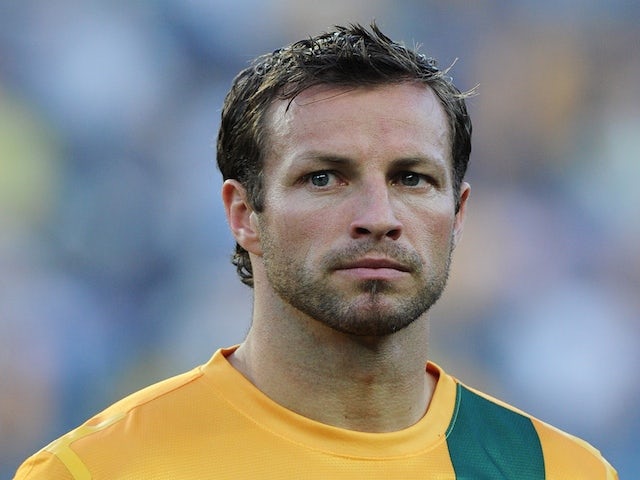 Australia's captain Lucas Neill listens to the national anthem prior to the football friendly against Costa Rica on November 19, 2013